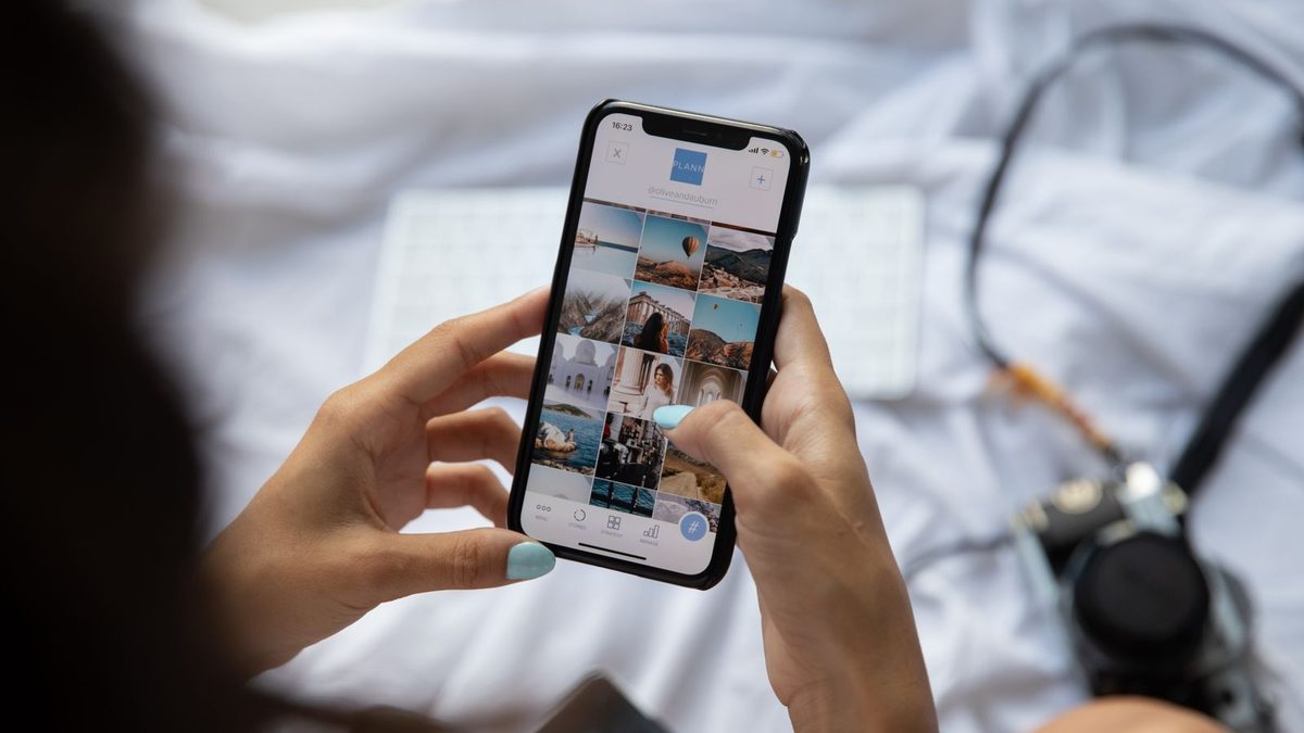 A person using a finished mobile app on a smartphone
